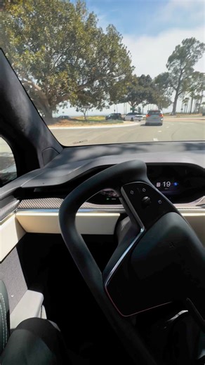 Tesla FSD at beach college handles UCSB graduation ceremony traffic, did great expect the confusing human redirecting traffic and my first intervention in about two weeks, not safety critical but would be an issue. Waymo and Lyft etc had specific drop off locations so I think Tesla FSD can handle that situation | Jianchun Xu