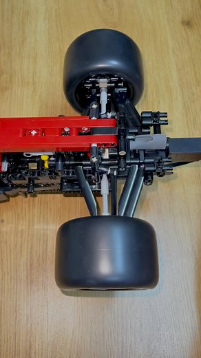 Differential System Test With Wheels .. CaDA Alfa Romeo F1 Team ORLEN C42 C64005W @doubleeagle_cada #cada #doubleecada #cadamaster #alfaromeo #formula1 #f1 #buidingblocks #moc #formula1news | Bricks Master Builders