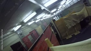 Riot police training inside the building. The policemen behind shields fire automatic weapons. Shot with a GoPro attached to a target. Stock Video