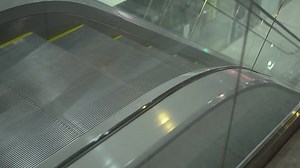 clip-24182605-moving-escalator-steps-goes-mall