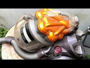 Dyson vacuum cleaner emptying Dyson DC19 vacuum cleaner dust container emptying instructions