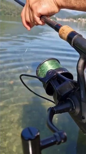 Remote-Controlled Fishing Boat with Fish Lure and Hook Delivery