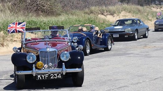 85-year-old car lover is surprised with a huge vintage car parade for his birthday