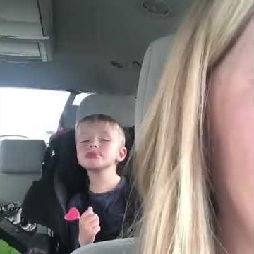 Little Boy Attempts to Lick Lollipop While Falling Asleep - 987227