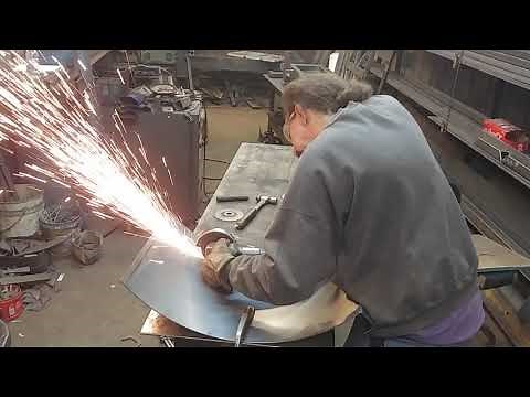 Cutting Steel plate or sheet metal with a .040 Cut Off Wheel in a Grinder. Minnesota Implement.
