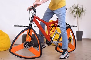 Unique Reuleaux triangle-shaped wheels on this bike are far more comfortable than you’d imagine - Yanko Design