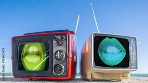retro television and female lips on the screen on a beach