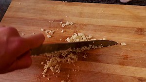 The Key To Mincing Garlic Is To Go Slow & Steady