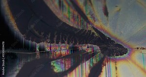 Crackled screen. Matrix damage. Rainbow distortion of computer display. Black shapeless dead zone spot glitch proliferation with broken pixels.