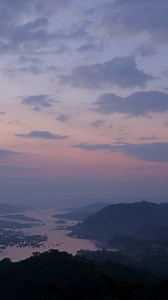 Download Vertical time lapse video of dramatic from dawn until sunrise over a river in a sunny day. for free