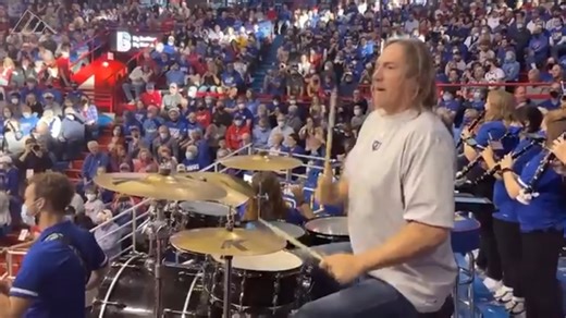Danny Carey of Tool performs during halftime show at University of Kansas