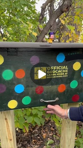 Geocaching on Instagram: "🕺Twist and shout your way through this gadget cache find! 💃 Have you checked Gilby, North Dakota, off your geocaching bucket list? Video by giacaches. Video: A geocacher stands in front of a wooden cabinet that is held up by two wooden posts. The cabinet is painted with polka dots and has the words “ OFFICIAL GEOCACHE, LEARN MORE AT GEOCACHING.COM” written on the front. The geocacher grabs the handle to the cabinet door and opens it. Inside, a wooden panel with many b