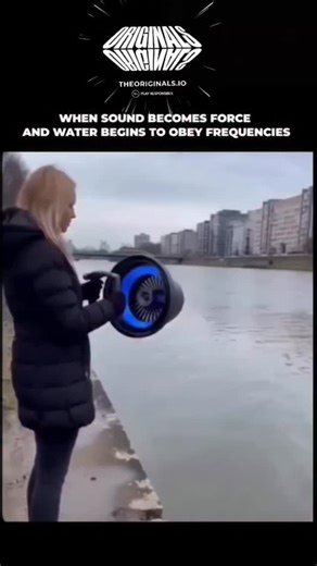 Science Knowledge on Instagram: "That video is a striking example of "Cymatics" or acoustic levitation, but it's important to note that what you're seeing is digitally altered or simulated. In reality, while sound waves can indeed manipulate water, the effect shown—where a woman holds a handheld device that carves a massive, sustained "tunnel" through a river—is not physically possible with current technology. The Visuals: A woman stands by a body of water holding a futuristic-looking "sonic can