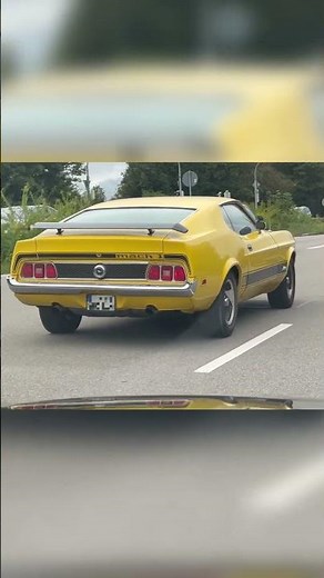 Yellow Ford Mustang Mach 1 Flies Past on the Highway
