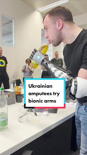 #Two #Ukrainian #soldiers, #wounded by #landmines, tried out #bionic #arms made in the #UK. The #HeroArm has #moveable #fingers and #thumbs that allow them to #pinch and #grasp objects
