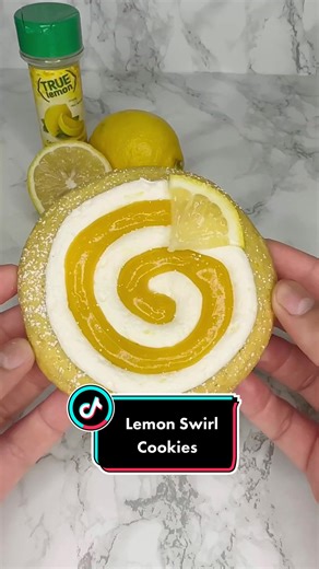 Lemon Swirl Cookies 🍋 ft. @True Lemon Crystallized Lemon shakers Find True Lemon Crystallized lemon shakers on Amazon Ingredients: Lemon Cookie - 1 cup sugar - 1/2 tsp True Lemon crystallized lemon - 1 whole egg 1 yolk - 1 stick and half salted butter - 1 tsp vanilla extract - 2 1/4 cups AP flour - 2 tbsp corn starch - 1 tsp baking soda Lemon Buttercream - 1 1/2 sticks salted butter (room temp) - 3 cups powdered sugar - 1 tsp True Lemon crystallized lemon - 1 tbsp milk Lemon Curd (see previous 