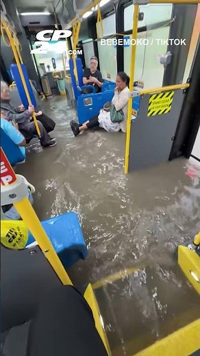 Floodwaters rush into TTC bus during Toronto thunderstorm