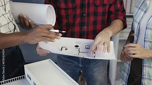 Architects collaborate on building blueprint, planning and analyzing for construction projects. Brainstorming and teamwork in design meeting Stock Video