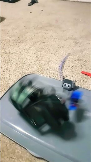 lego car destroyed by big car