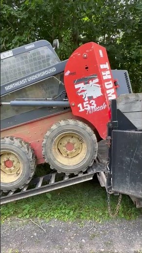 How to properly load a skid steer on a dump trailer.