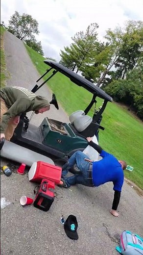 Drunk Riders Tip Their Golf Cart Over as They Try to Drive Uphill - 1512645