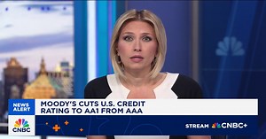 Moody's cuts U.S. credit rating to AA1 from AAA