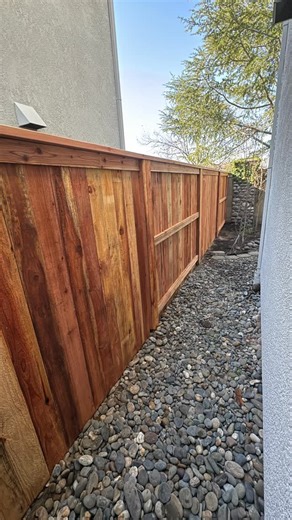 A&B Fencing Company / Sacramento. Ca on Instagram: "Beautiful Redwood Fence Three-rail construction with a clean top cap & trim, built as a true good-neighbor fence — meaning it looks just as good from both sides. Set on bolt-up steel posts for long-term strength, stability, and a flawless finish. Material- @bercoredwood 🌲"