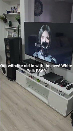 new white polk ES60 tower speakers.