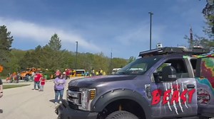 News 8 meteorologist Morgan Strackbein introduces viewers to The Beast at 'Touch-a-Truck' event