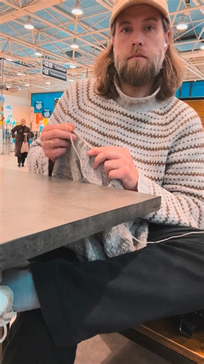 Rasmus Valentino Mandal Larsen on Instagram: "My face looks tense, but my hands are trying to teach me peace. Some days, slowing down feels uncomfortable — like my body forgot how to rest. But I stay. I breathe. I knit. Because somewhere in the stitches, I always find a bit of calm. 🧶💭 I’m knitting on my “summer” project - a soft and light t-shirt in Alpaca silk from @hobbii.dk / @hobbii_yarn I’m looking so much forward to finish it. 🥵 #mandestrik #mandestrikxhobbii #mandestrikpåtur #sponsore