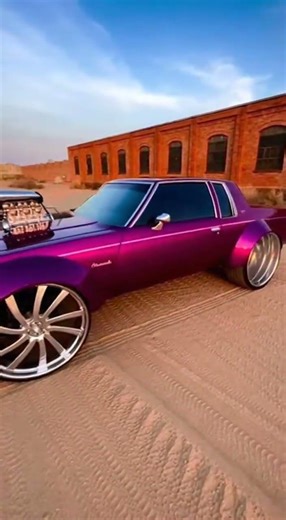 Purple widebody 1979 Box Chevy with a blower engine in a sand Slomo Camera move