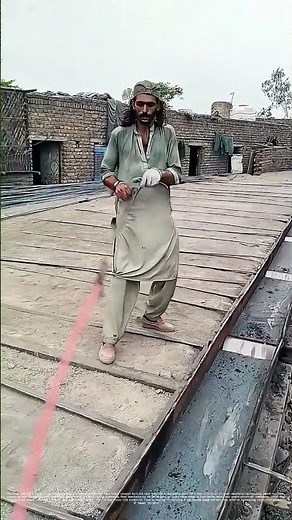 Gripping Heat: How Workers Streamline Steel Beam Production