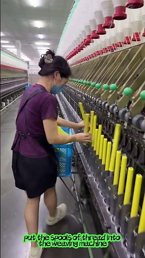 put the spools of thread into the weaving machine