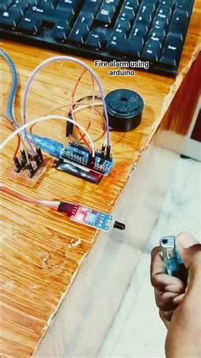 fire alarm using arduino 🤖#shorts #ytshorts #shortsfeed #arduino #projects #coding #ai #electronics