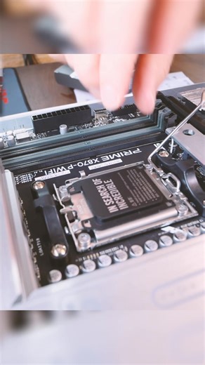 He's fitting an AM5 Slot CPU, specifically an AMD Ryzen 9 9950X onto an X870 motherboard. He drops it into place. It feels like a lot of force, but it seems okay. All done. #AM5 #Ryzen9 #9950X #X870 #CPUUpgrade | Evaluate Everything