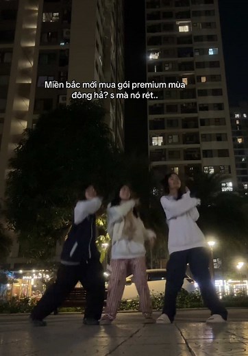 Synchronized Dance Routine in Urban Night Setting