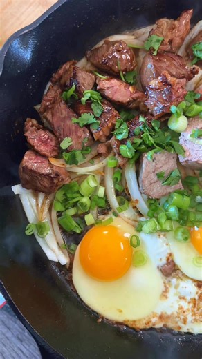 Bò né or sizzling Vietnamese steak and eggs is one of my favorite Vietnamese foods. It’s a popular breakfast meal but it’s delicious any time of day…and especially late at night. Steak is marinated in an umami rich sauce and it’s cooked down on a sizzling plate, filled with eggs, pate, onions and tomatoes. It’s most commonly eaten with some freshly toasted bread so it’s almost like a make-your-own banh miIngredients1 lb steak diced into chunks (I used a boneless ribeye)2 tbsp oyster sauce1 tbsp 