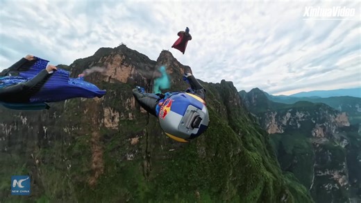 6.6K views · 28 reactions | Get ready for an adrenaline rush as the world's top wingsuiters, Espen Fadnes and Amber Forte, take to the skies with their jaw-dropping stunts and mesmerizing aerial acrobatics in southwest China's Yunnan! | Xinhua Culture&Travel | Facebook