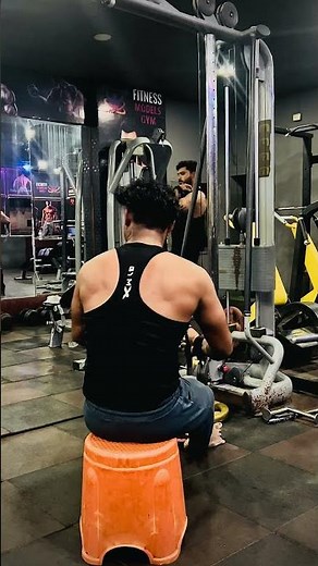 Back workout at gym |
