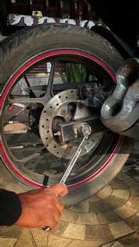 ഇത്രേ ഉള്ളോ? Chain slack adjustment on a motorcycle DIY #shorts