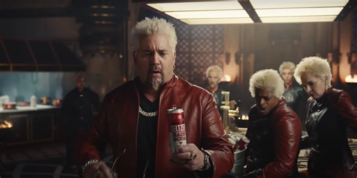 The Flamin' Hot Cheetos and Doritos Super Bowl Commercial Was Just As Fun As It Was Weird