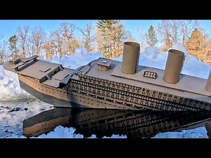 CARDBOARD SHIP HITS ICEBERG AND SINKS