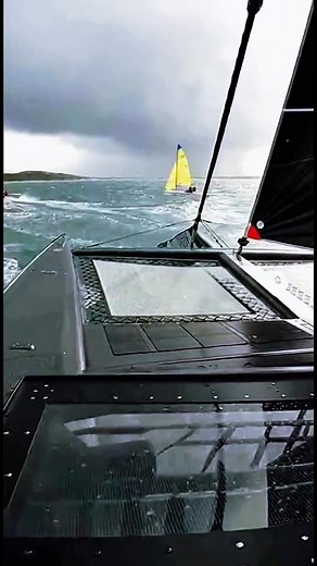 #fblifestyle That moment when a MASSIVE catamaran overtakes the whole fleet in a storm… 😳🔥 Small boats nearly flip from the wake — sailors fighting for balance — pure ocean chaos! This POV feels TOO REAL. 🌊⚡⛵ #CatamaranPower #StormSailing #SailingChaos #HighAdrenaline #OceanRacing #YachtRace #WildSeas #SailingLife | Love Sailing