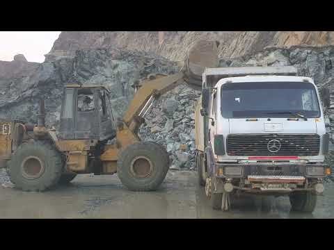 Powerful Wheel Loader Loading Heavy Rocks into Mercedes Dump Truck | Extreme Quarry Work