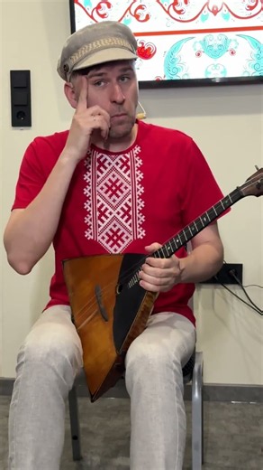 Balalaika player on a ship