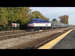 METRA-402 state of Illinois heritage unit NCS train speeds passes Mars on Milwaukee district west