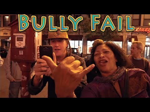 Bully Harassing Street Performer gets owned