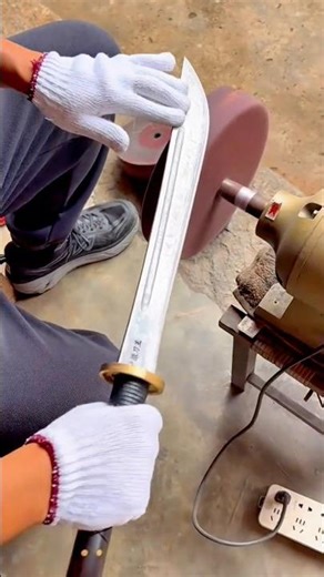 Sharpening and Polishing a Sword Blade Using a Rotating Grinding Wheel Machine #shorts