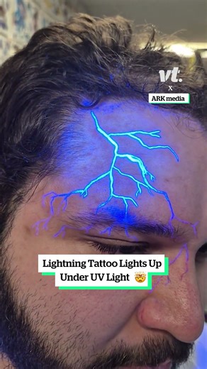 Lightning tattoo lights up under UV light 🤯