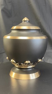 Renaissance Bronze Cremation Urn by Memorials.com The Renaissance Bronze Cremation Urn is a solid cast bronze urn, made in the 'lost wax' process. The patina finish on the urn gives it a breathtaking, gun-metal color and the raised portions are buffed and polished to bring out the natural luster of the bronze. This regal vessel will become a truly dignified final resting place. Bottom opening threaded stopper. (Made from Real Bronze) #memorialscom #funeralurnashes #FuneralUrns #solidbonze #bronz